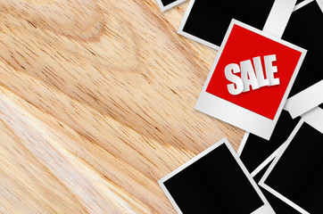 Sale paper label on wooden