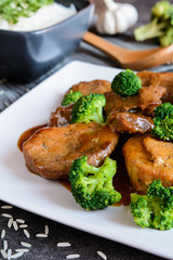 Steamed pork with balsamic vinegar and roasted broccoli and rice