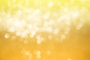Abstract bokeh background in gold color