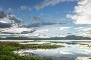 Obraz premium Lake and mountain view at Huay Mai Teng Reservoir, Ratchaburi, T