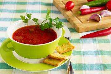 Tomato soup gazpacho in a green cup.
