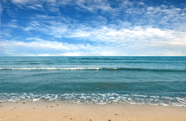 Fototapeta na wymiar Black sea beach blue sky sand sun daylight