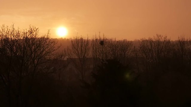 Sun shining before the sunset with heavy rain slow-mo 1920X1080 FullHD video - Sun going down before sunset with rain natural phenomenon in slow motion 1080p HD footage 