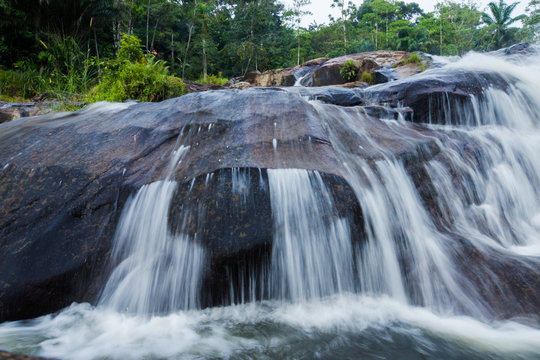 Waterfall in tropical forest.