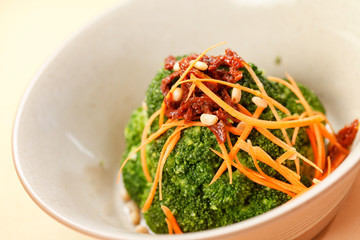 broccoli with carrot and dried tomato