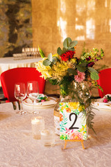 Decorated table, vases of flowers. Close up. Wedding concept