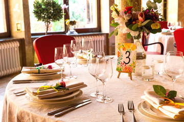 Decorated table, vases of flowers. Close up. Wedding concept