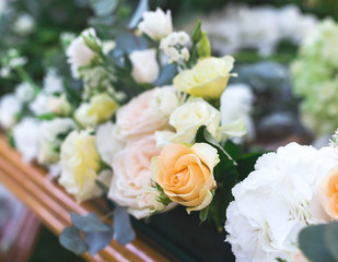 Flowers bouquet arrange for decoration in restaurant.