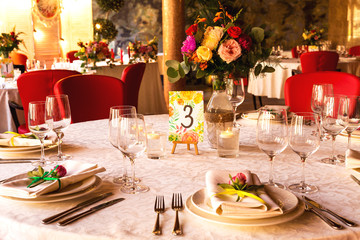 Decorated table, vases of flowers. Close up. Wedding concept