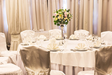 Decorated table, vases of flowers. Close up. Wedding concept