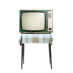Vintage green TV, at the table with blue checkered tablecloth