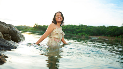 girl in dress in water