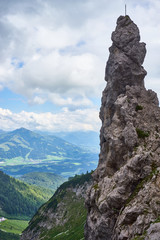 Rocky peaks in alps / steep slope of Wilder Kaiser in Austria 