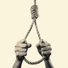 hands hold the hanging Lynch's loop
