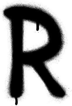 sprayed R font graffiti with leak in black over white