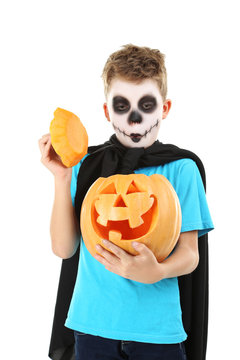 Little Boy In Halloween Costume With Pumpkin On White Background