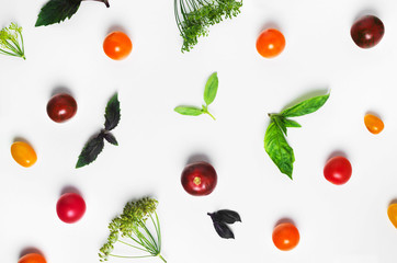 Food pattern of multicolored tomato basil and dill on top
