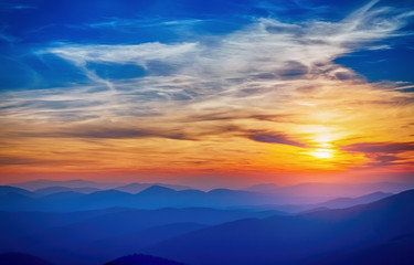 Colorful sunset sunshine clouds and above blue
