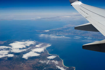 Under the wing of the plane