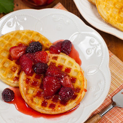 Waffles with Fresh Strawberry Syrup. Selective focus.