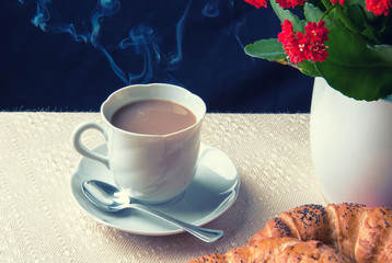 Coffee and croissant for breakfast