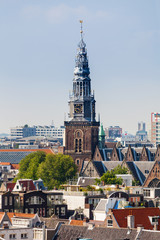 Panorama of residential areas. Aerial view. Amsterdam from above, apartment buildings, historic houses of the old city quarter, Holland, Netherlands.