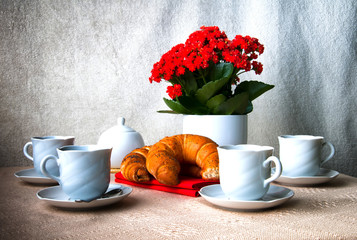 Coffee and croissant for breakfast