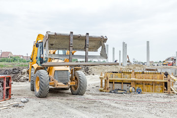 Armature rod delivery at building site. Logistics concept