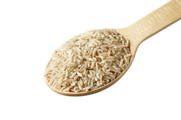 Unpolished rice in a wooden spoon