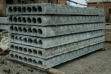 concrete plates stacked in a column
