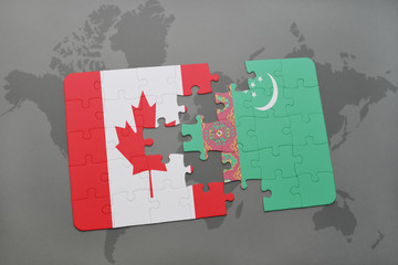 puzzle with the national flag of canada and turkmenistan on a world map background.