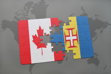 puzzle with the national flag of canada and madeira on a world map background.