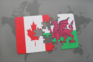 puzzle with the national flag of canada and wales on a world map background.