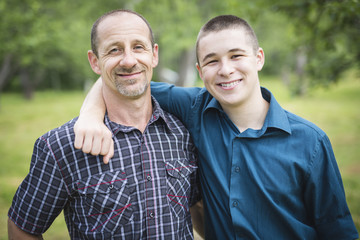 Father with son outside in a forest