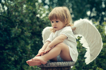 Little cupid on the chair