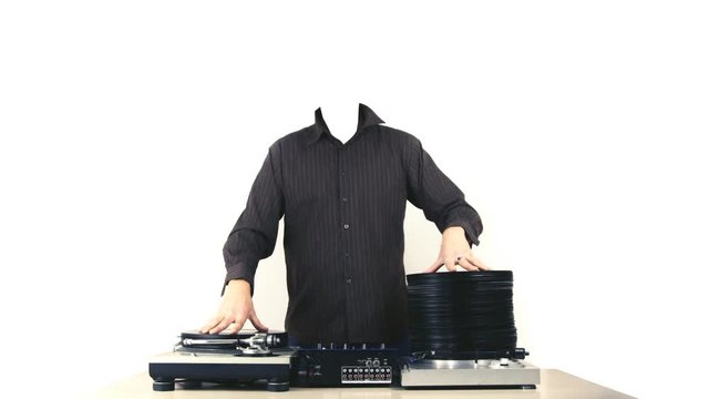 headless dj with piles of records growing