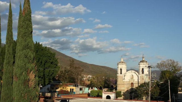 sun sets over a church