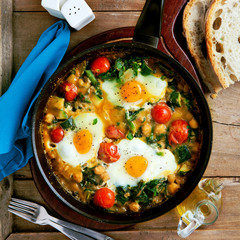 frittata with tomatoes, spinach, chickpeas, eggs, zucchini and f