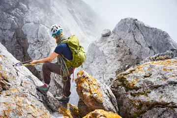 Gardinen woman climbing in mountains of Austria / Extreme Sports in the Alps © marako85