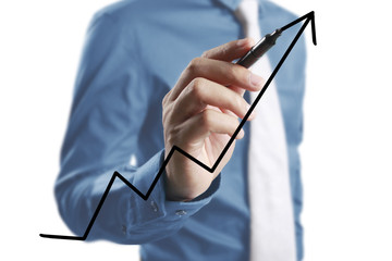 Businessman drawing graphics  growing graph