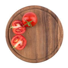 Chopped tomatoes on cutting board.