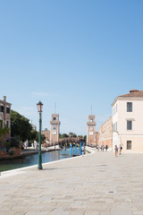 Fototapeta na wymiar Canal and traditional buildings in Giardini in Venice, Italy 