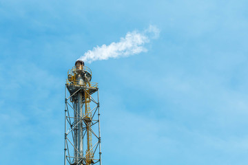 Polluting white smoke coming out of chimney