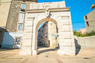     Old gates and street in the old town of Cres, Croatia, Mediterranean ambient  © ilijaa