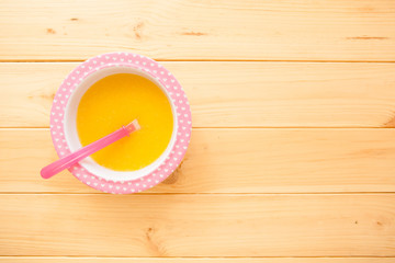 Healthy natural eco baby lure. Soup of squash, carrot, onion, ca
