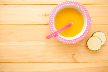 Healthy natural eco baby lure. Soup of squash, carrot, onion, ca