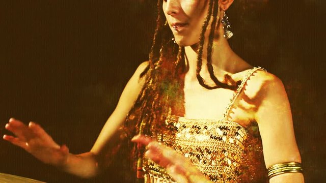 female percussion drummer performing with bongos