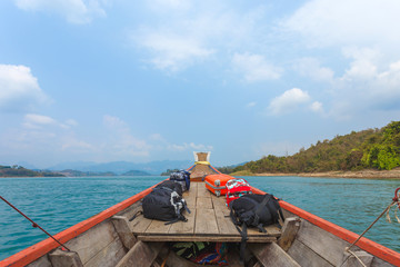 Fototapeta premium Traveler with backpack cruise through the river valley