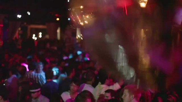 glitterball turning on the nightclub dancefloor