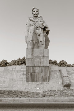 NOVOROSSIYSK, RUSSIA - AUGUST 3, 2016: a monument to the sailors of the revolution near the highway in Novorossiysk city in summer, Russia. black and white monochrome photo
